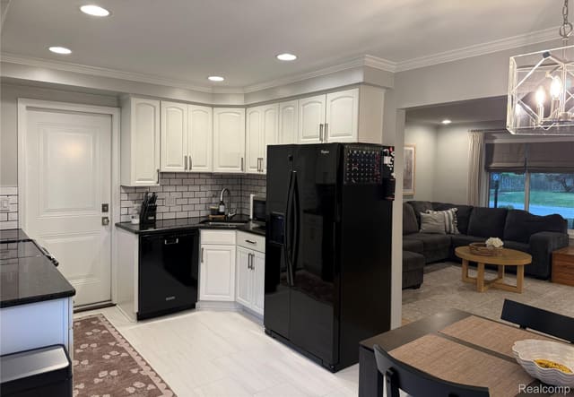 Updated kitchen opening to the dining area