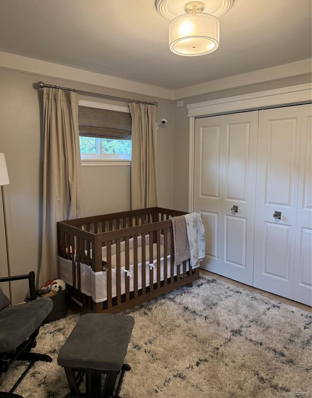 Nursery corner with crib and double closet